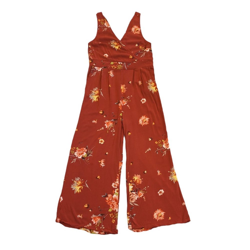 Torrid red floral surplice/wrap front jumpsuit w/ V-neck, wide legs & pockets